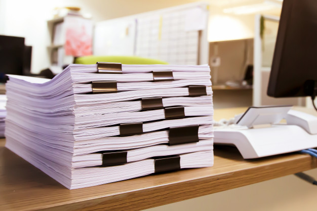 pile-lots-paperwork-report-printout-document-desk-office-stacked